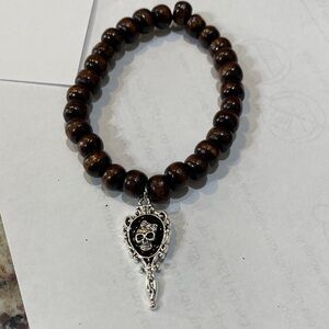 Brown Beaded Bracelet with Silver Charm